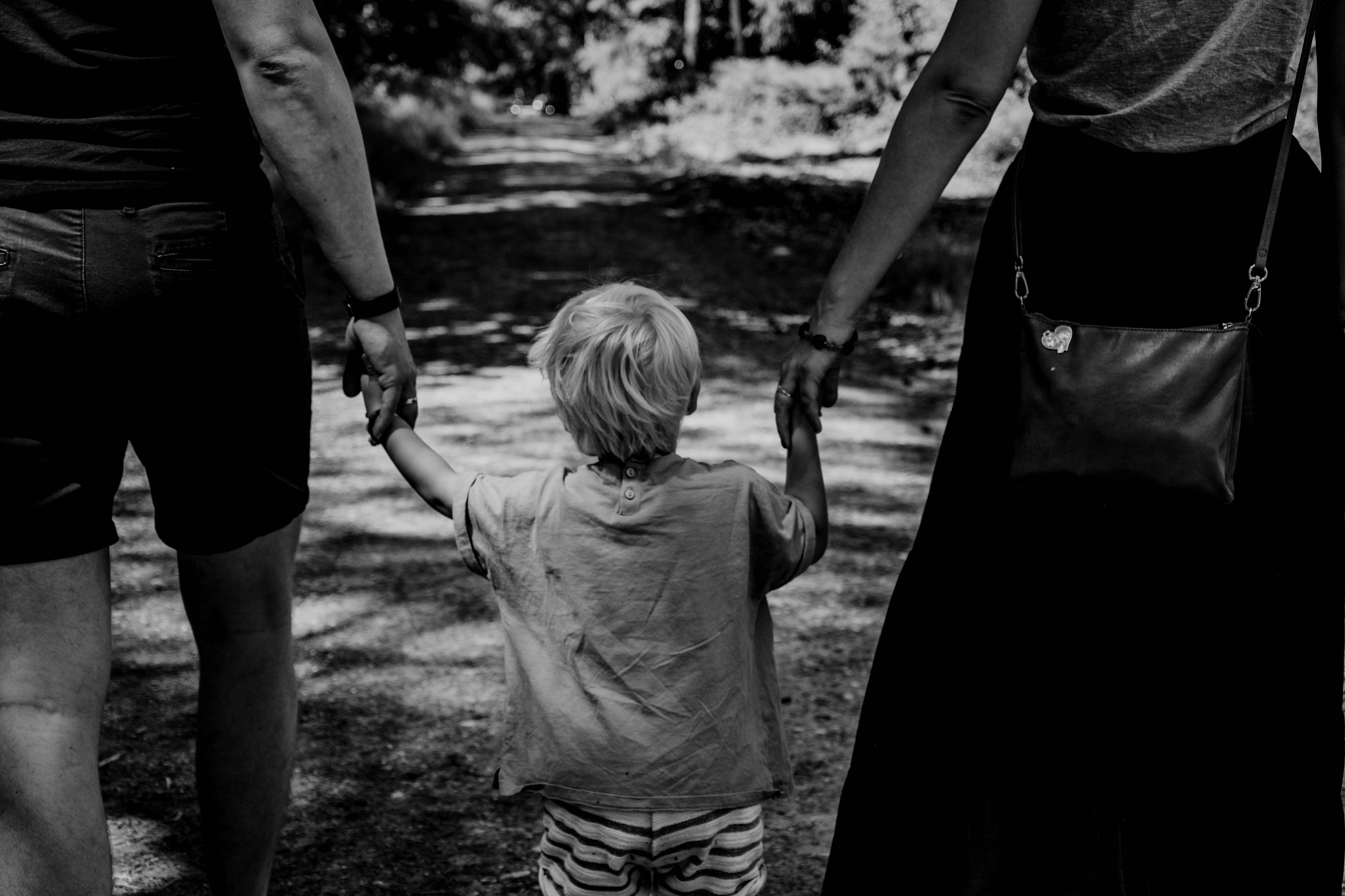 child-holding-hands-wth-toddler