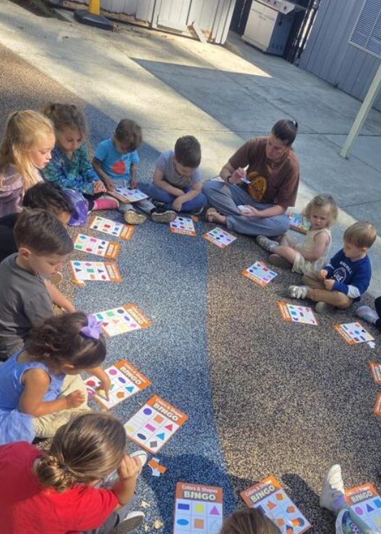 Kids learning outside at preschool
